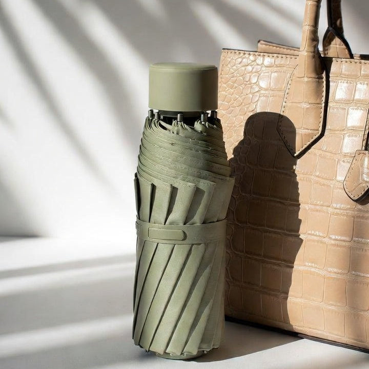 A lightweight khaki-colored umbrella for summer